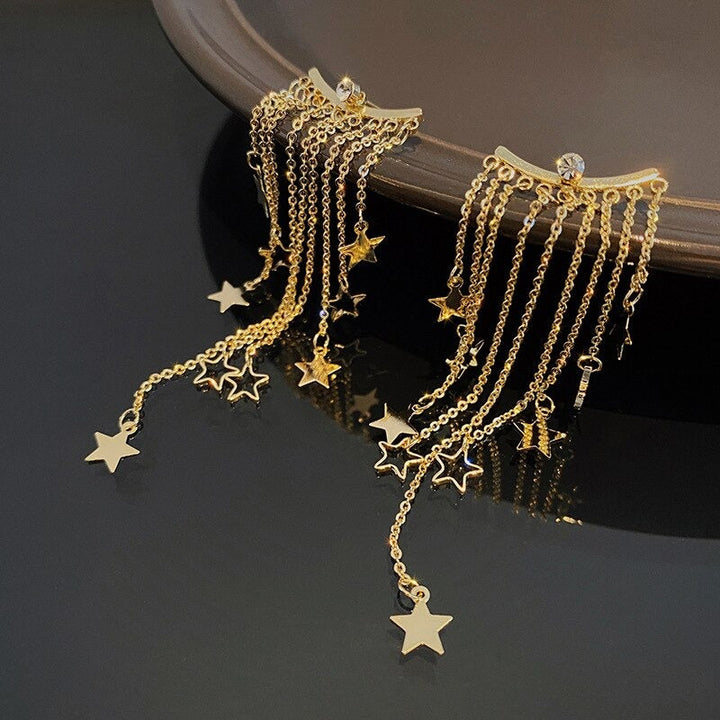 PAIRE DE BOUCLES D'OREILLES ÉTOILÉES AVEC FRANGES