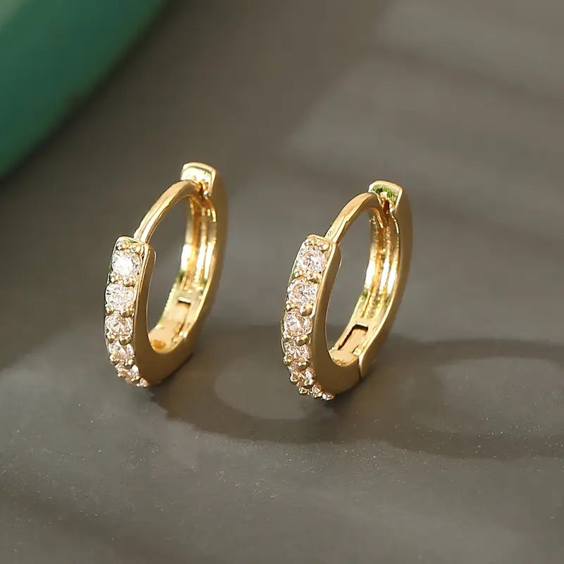 Boucles d'oreilles pendantes en or inspirées par la côte