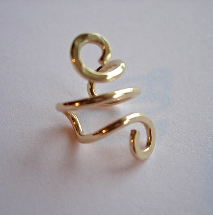 OREILLES EN OR : BOUCLES ÉLÉGANTES