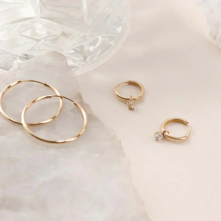 Boucles d'oreilles créoles avec pierres Larmes de Lune