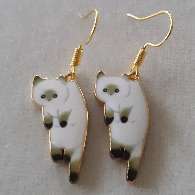 PAIRE DE BOUCLES D'OREILLES PENDANTES EN FORME DE CHATONS