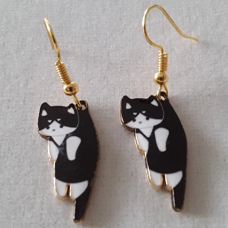 PAIRE DE BOUCLES D'OREILLES PENDANTES EN FORME DE CHATONS