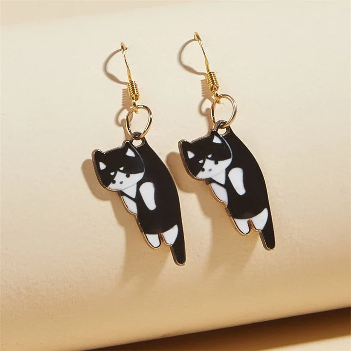 PAIRE DE BOUCLES D'OREILLES PENDANTES EN FORME DE CHATONS