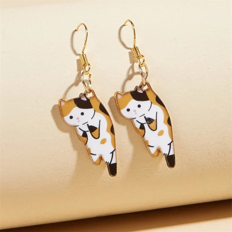PAIRE DE BOUCLES D'OREILLES PENDANTES EN FORME DE CHATONS