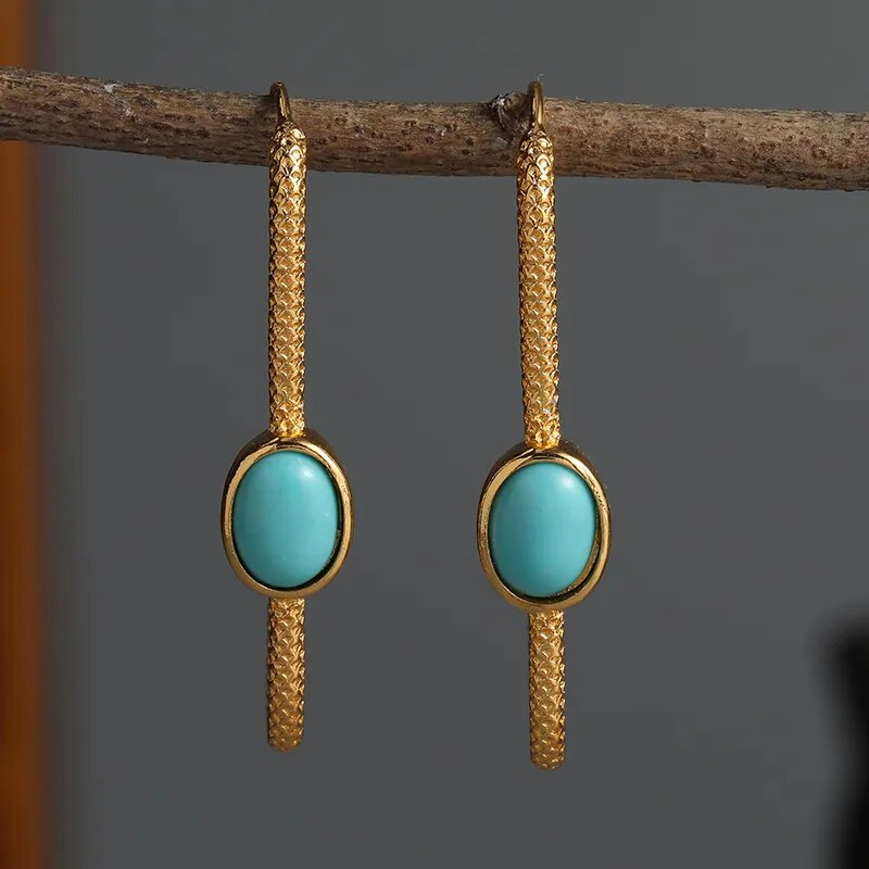 Boucles d'oreilles en turquoise élégantes en or