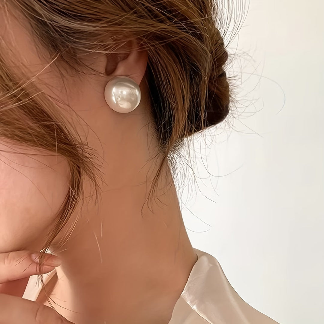 Les Boucles d'Oreilles Perle Statement