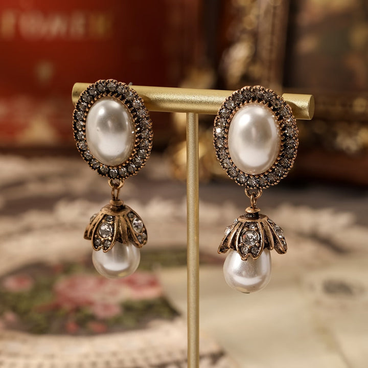 Boucles d'oreilles pendantes vintage en perles