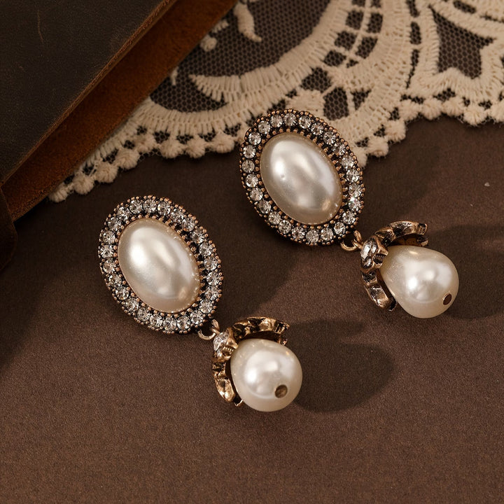 Boucles d'oreilles pendantes vintage en perles