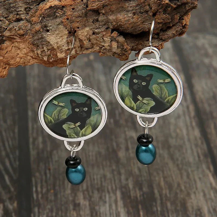 Boucles d'oreilles vintage noires à motifs tropicaux