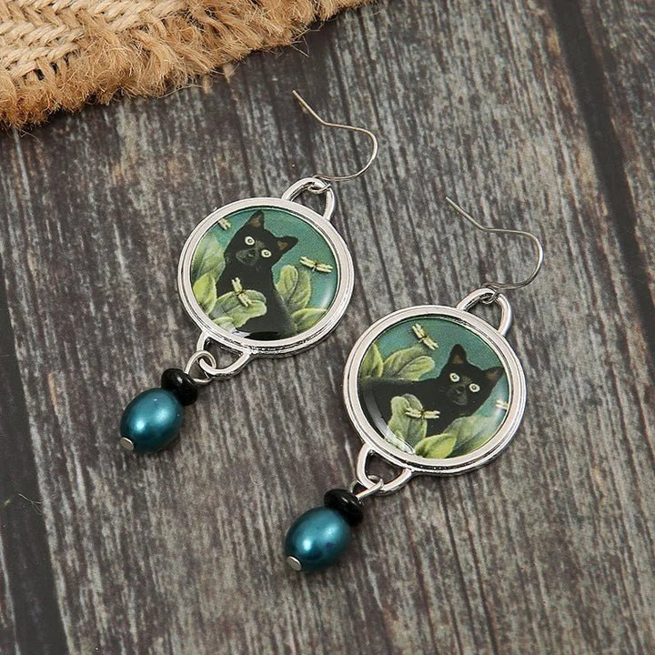 Boucles d'oreilles vintage noires à motifs tropicaux